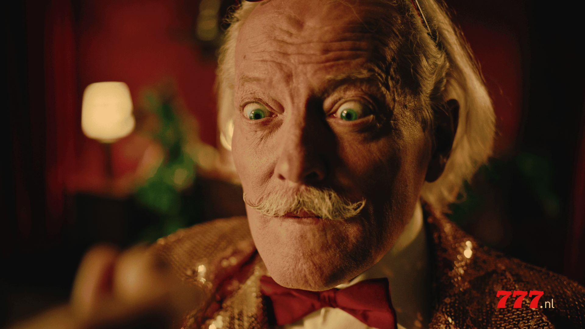 Close-up of an elderly man with surprised expression, vibrant background.