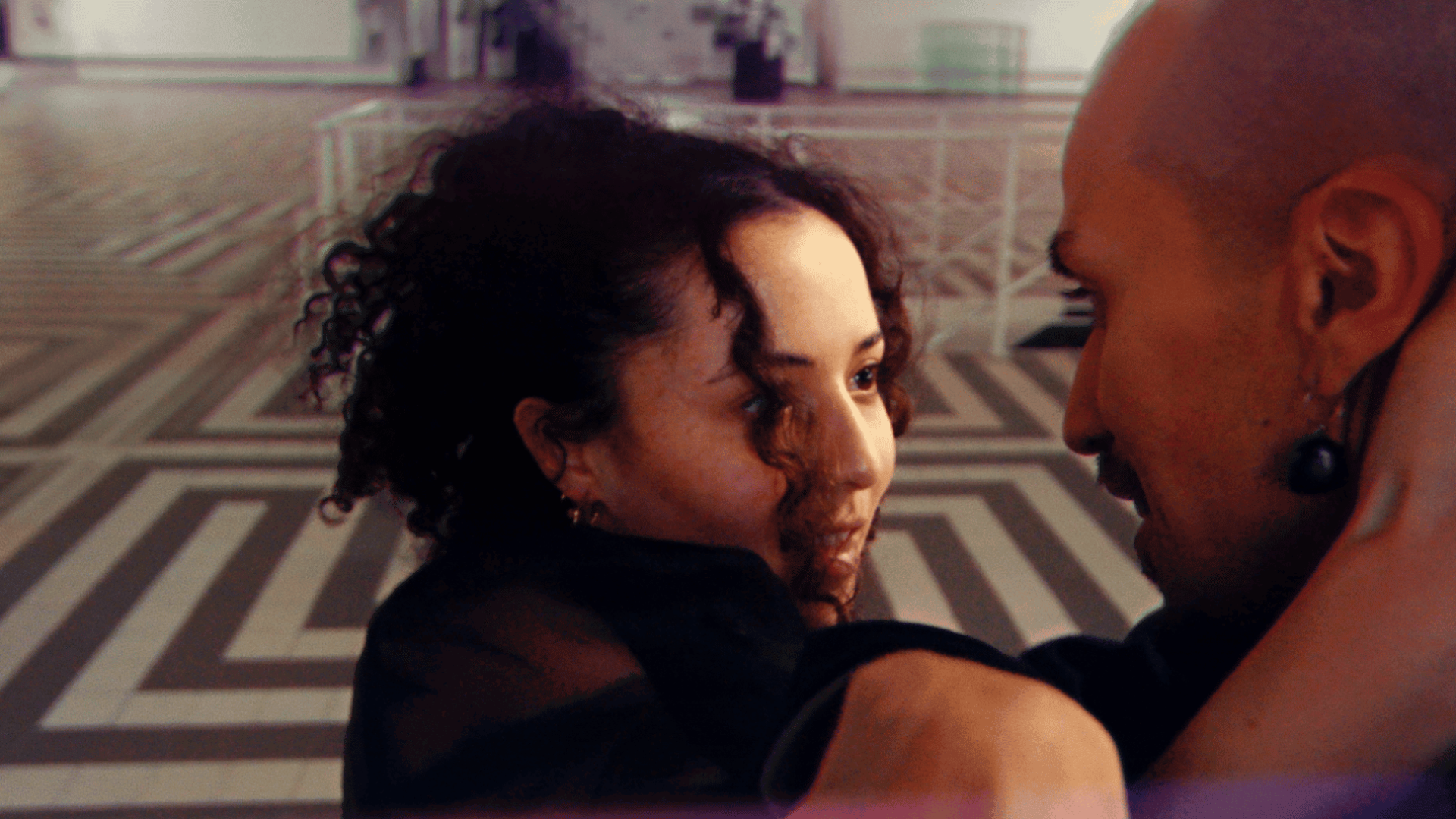 Up of a couple dancing passionately outdoors.