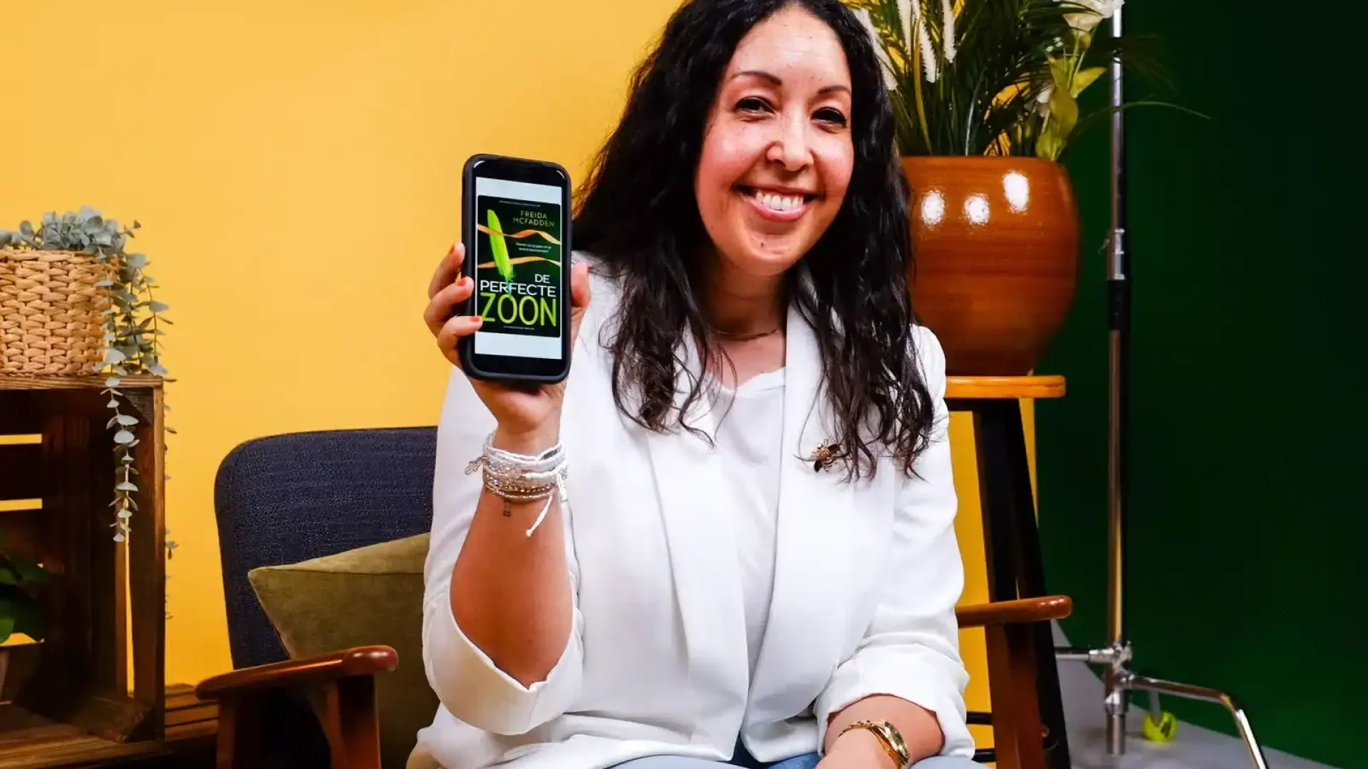 Creative video agency team member showcasing mobile video content.